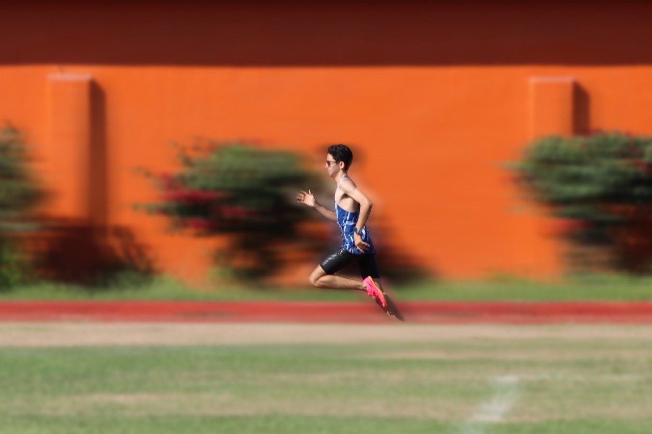 Athlete celebrating on track